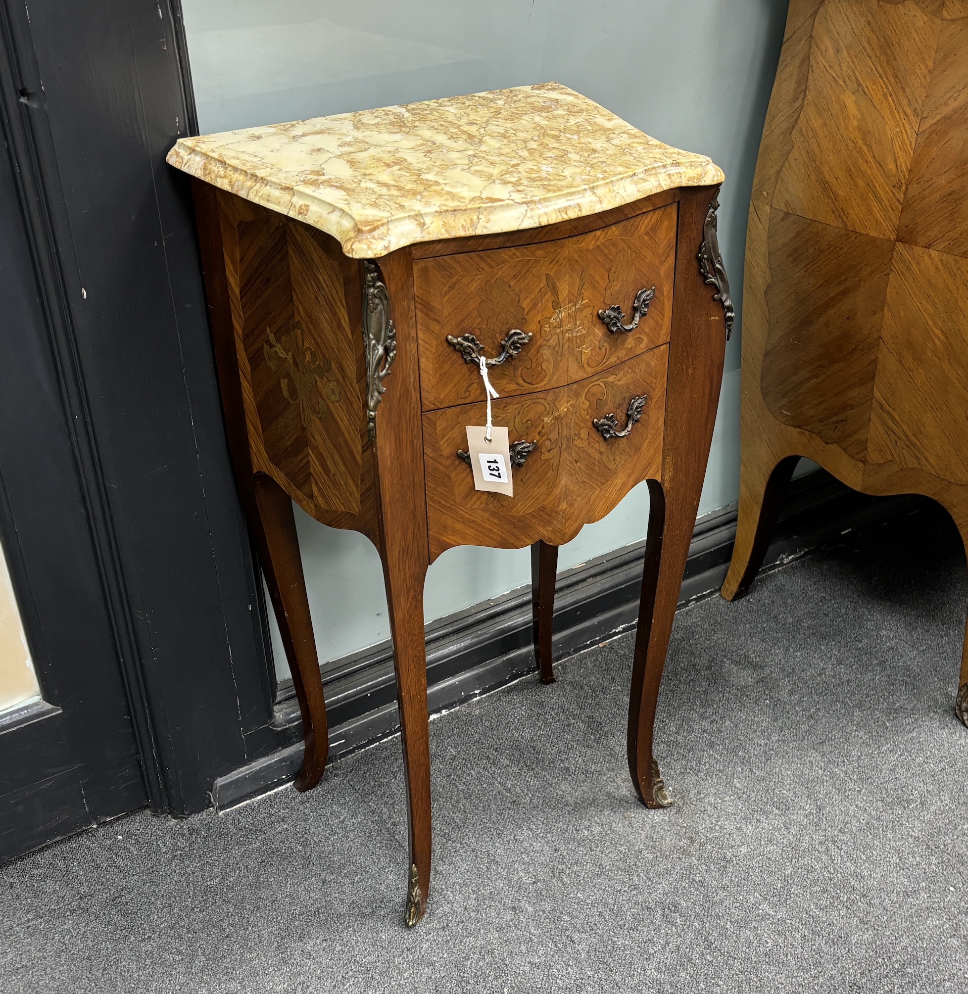 A pair of Louis XVI style inlaid kingwood marbled top serpentine bedside chests, width 42cm, depth 31cm, height 75cm